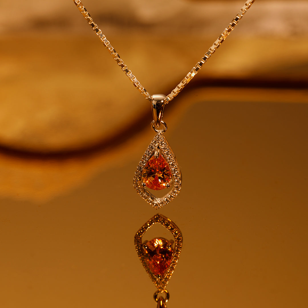 Sienna Arc Pendant Necklace – Champagne Zirconia